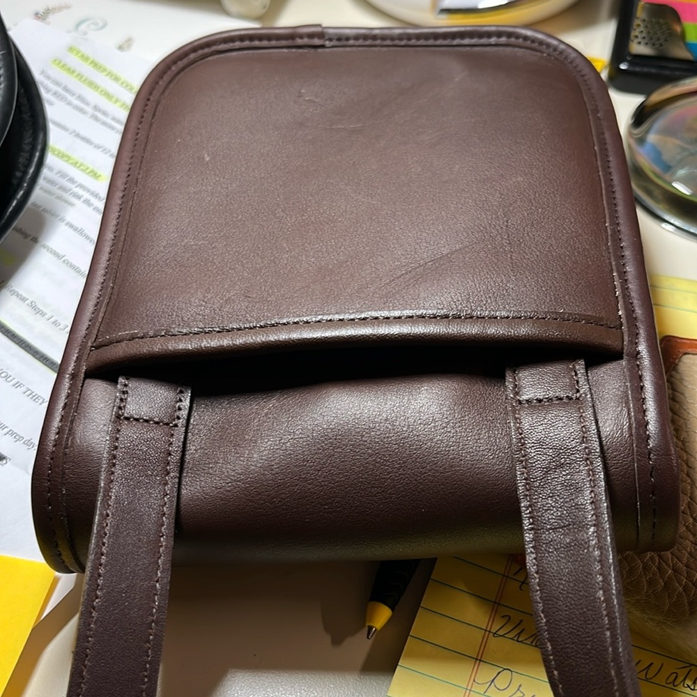 Coach vintage small side pack brown leather with brass hardware. Brand new
